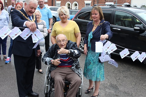 Jim Brazier cutting the Radfield House opening ribbon 479x323