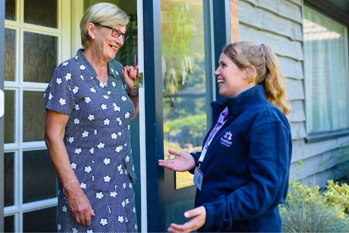 carer and client talking