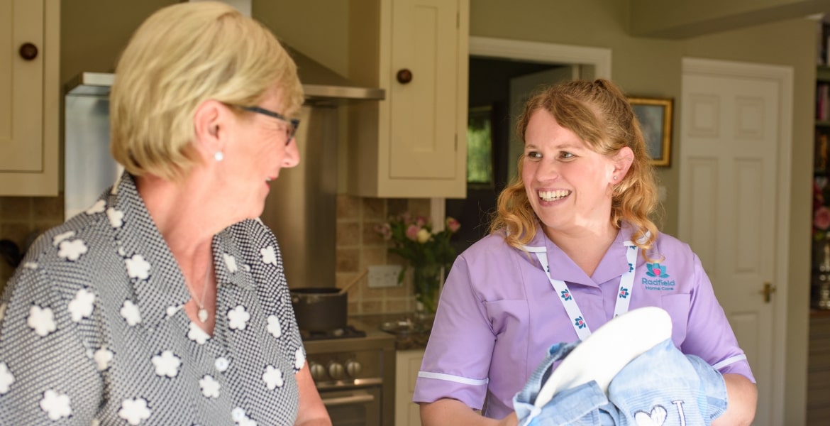 Care professional and patient smiling | Radfield Home Care