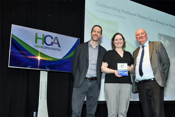 Dr Hannah MacKechnie accepting the award for Most Outstanding Home Care Group or Franchise Network