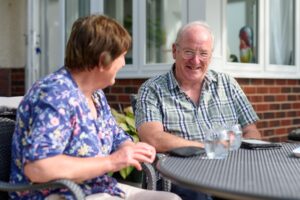 A couple enjoying live in care as a care home alternative