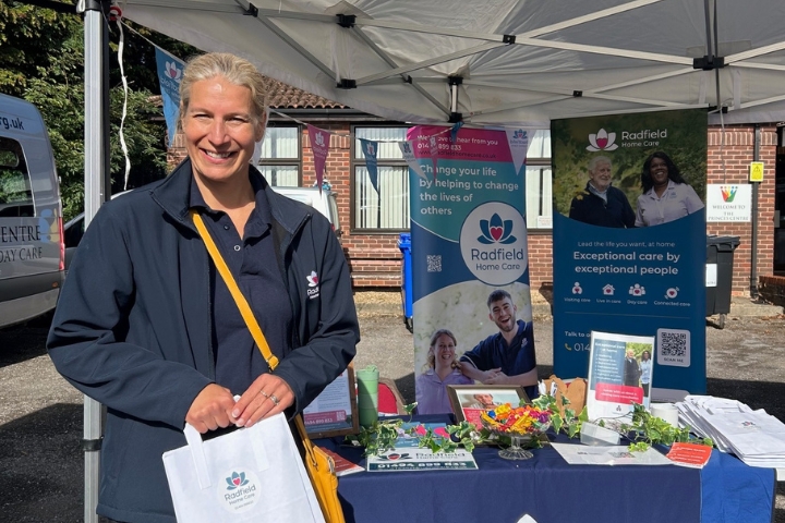 Radfield team smiling at community event in Wycombe.