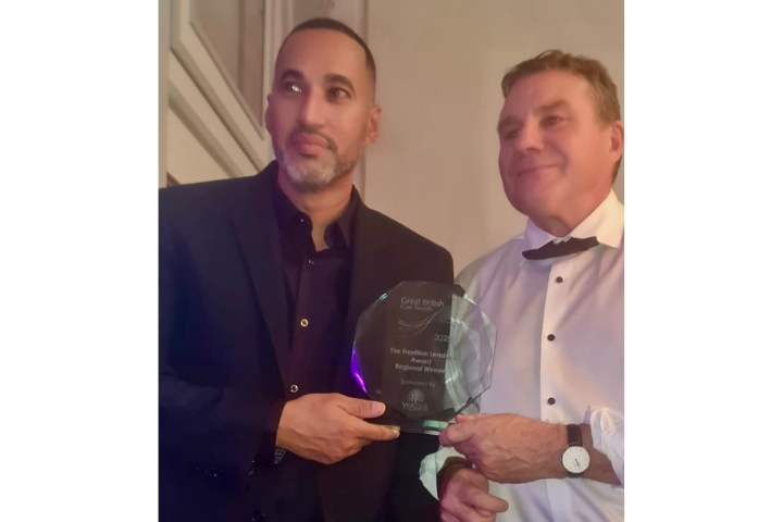 Dave and Denys accepting award.