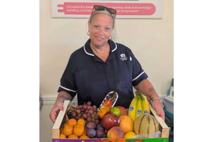 Amber visiting the local fruit and veg stall on Leatherhead High Street.