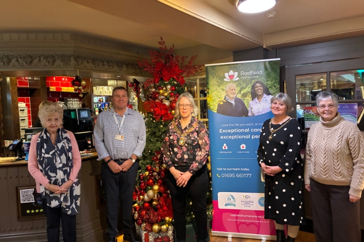 Group photo of Joe Sherville, the Mayor and Mayoress of West Lancashire, Radfield Home Care representatives and guests at the fundraising celebration in Ormskirk.