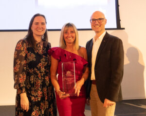 Julie Scott receiving her Franchise Partner of the year award at the Radfield Home Care Conference