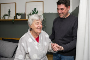 Live in care at home moment between a client and Care Professional 