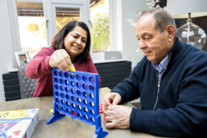 client and carer playing games