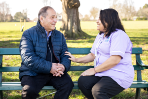 2 individuals discussing independence for older people