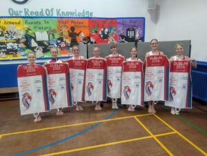 Hastings Dance Collective with their Radfield sponsored outfits heading to the Dance World Cup 2026