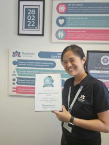 Radfield Home Care Barnet & Finchley's Po holding the Top 20 Home Care Provider in London award.
