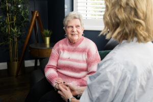 Client & Care Professional discussing the cost of home care for couples