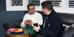 2 individuals discussing "is my parent safe to live alone?"
