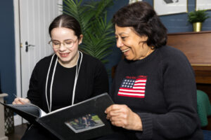 2 members of a family researching questions to ask when searching for care at home