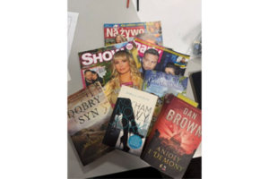 A few books from a client's collection brought over by a polish speaking carer