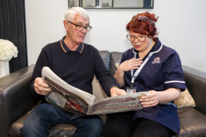 Care Professional and CLient reading a manual on What is an LPA