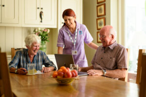 A Care Professional talking through kitchen safety for older parents