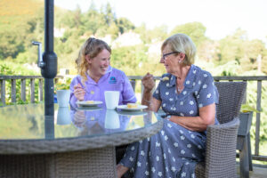 A Care Professional helping a client with social isolation in older people