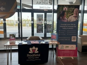 Amanda Saint at a Care Show, talking about care vacancies in Derby
