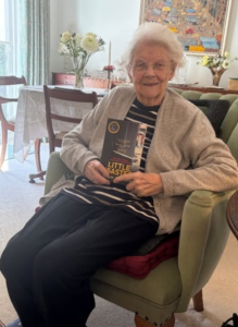 A client with her favourite book